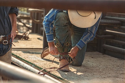 how to get cowboy boots to fit tighter